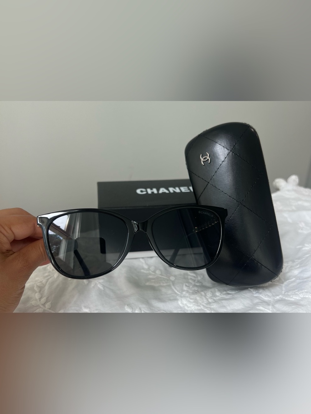 CHANEL Black Women’s Sunglasses with Dark Lenses.